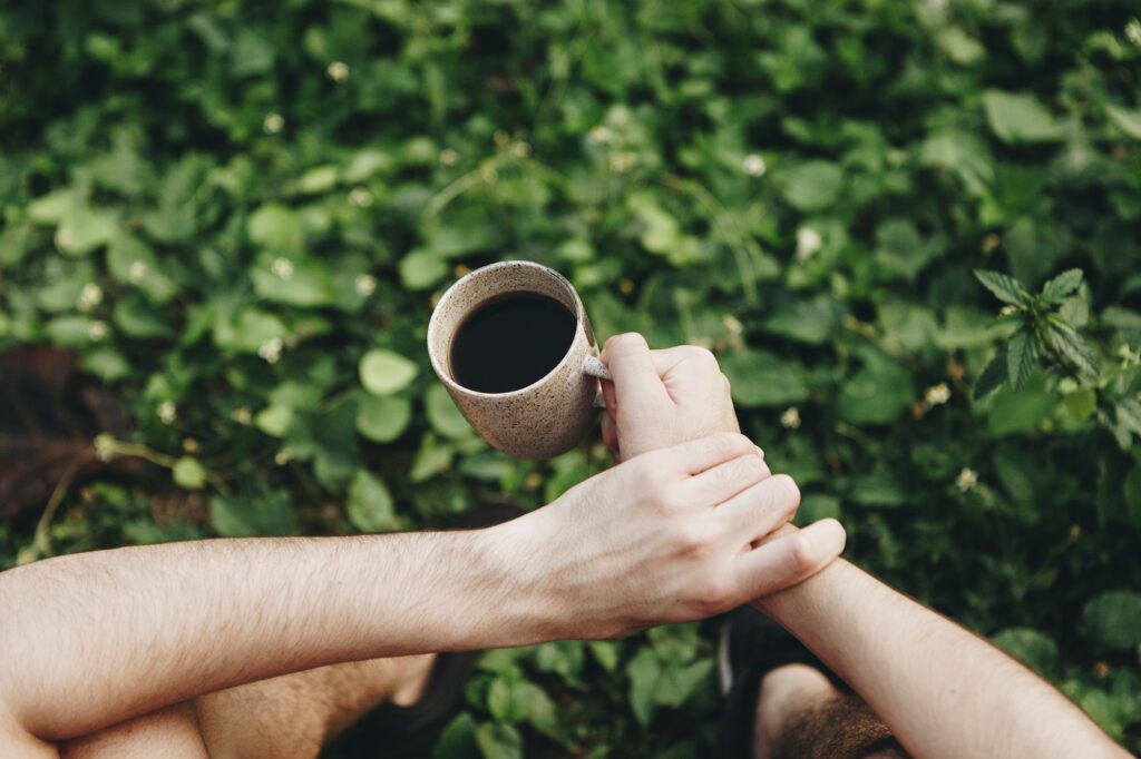 Man enjoying morning coffee in nature